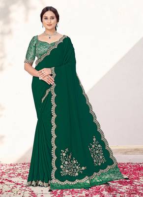 Green crepe silk blend heavy embroidered wedding wear saree 1