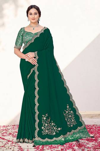 Green  crepe silk blend heavy embroidered wedding wear saree