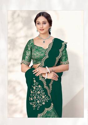 Green crepe silk blend heavy embroidered wedding wear saree 2