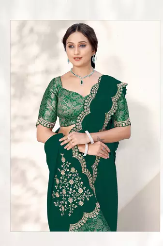 Green crepe silk blend heavy embroidered wedding wear saree