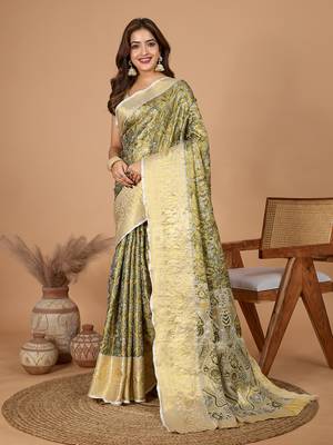 Green soft silk blend woven zari saree 1