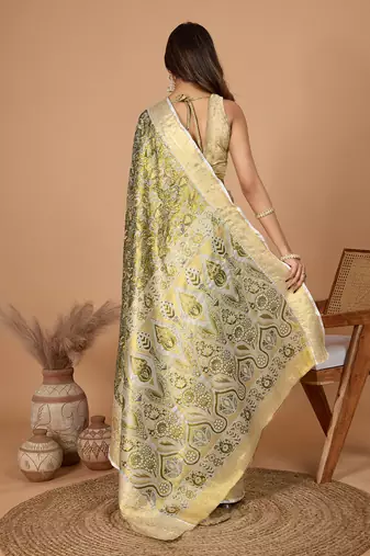 Green soft silk blend woven zari saree