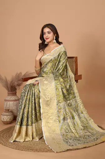 Green soft silk blend woven zari saree