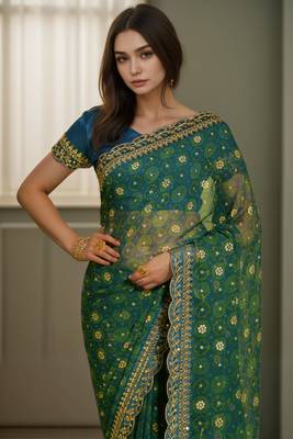 Petrol green printed lace emroidered georgette saree 2