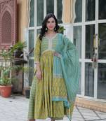 Green color ethnic cotton fabric designer printed anarkali style partywear dress