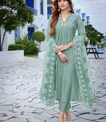 Green color beautiful and ethnic roman silk festive wear suit