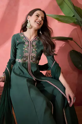 Green color resham embroidered festive wear ceremonial kurta set