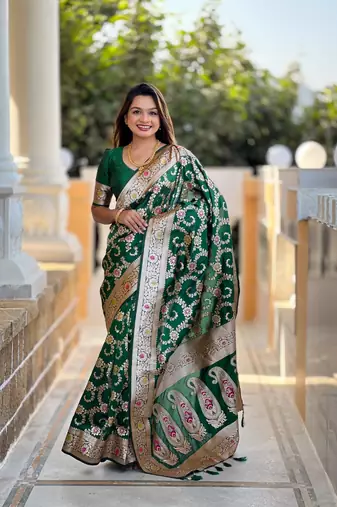 Green banarasi silk blend saree with zari weaving meenakari border