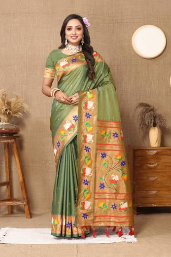 Green paithani silk blend saree with zari weaving  meenakari border
