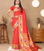 Orange paithani silk blend saree with zari weaving meenakari border