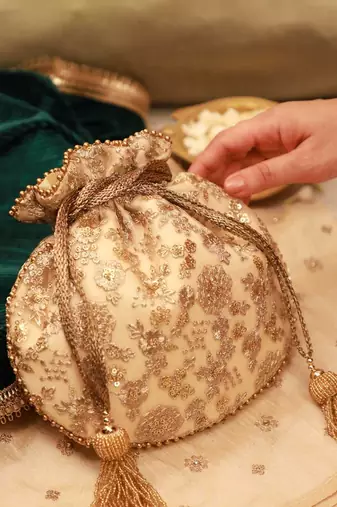 Ada embroidered potli - gold