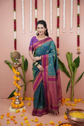 Teal dual zari motifs & contrast zari pallu saree