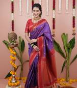 Purple dual zari motifs & contrast zari pallu saree