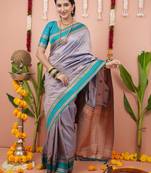 Silver dual zari motifs & contrast zari pallu saree