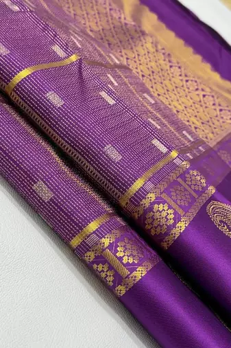 Purple silk blend saree with blouse piece