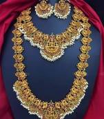 Regal lakshmi temple jewelry set - gold-plated necklace and earrings with pearl clusters