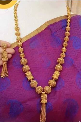 Elegant gold beaded tassel necklace - traditional indian long chain jewelry