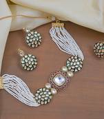 Luxury kundan pearl side necklace set - handcrafted indian bridal jewelry with green meenakari and ruby accents