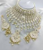 Elegant pearl choker necklace set with kundan work and matching earrings - bridal wedding collection