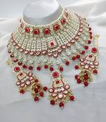 Elegant pearl choker necklace set with kundan work and matching earrings - bridal wedding collection