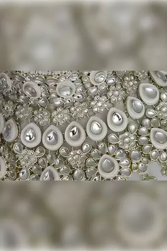 Luxurious white kundan bridal set - complete semi wedding jewelry collection with pearl embellishments