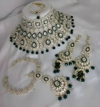 Luxurious green kundan bridal set - complete semi wedding jewelry collection with pearl embellishments 1