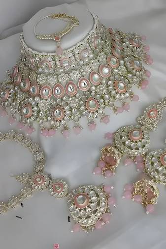 Luxurious rose quartz kundan bridal set - complete semi wedding jewelry collection with pearl embellishments