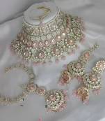 Luxurious rose quartz kundan bridal set - complete semi wedding jewelry collection with pearl embellishments