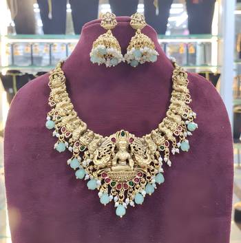 Opulent gold peacock lakshmi temple necklace set - handcrafted antique finish bridal jewelry with emerald & pearl accent 3