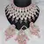 Graceful pink kundan & pearl bridal jewelry set-statement choker necklace earrings & maang tikka-wedding & festive wear