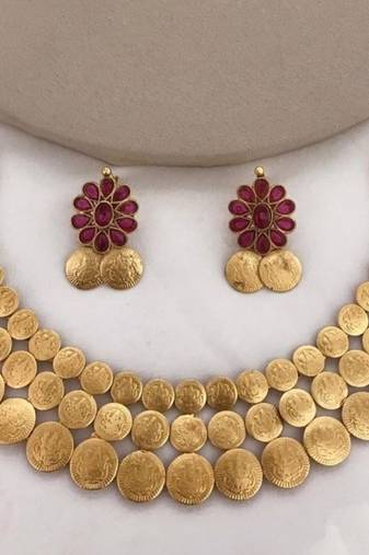Traditional lakshmi coin necklace set with vibrant red stones - antique gold temple jewelry set
