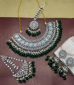 Green kundan choker necklace set with tikka, earrings & passa - handcrafted traditional wedding jewelry collection