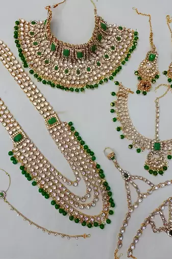 Royal indian bridal kundan jewelry set with green beads handcrafted gold-plated full dulhan set for wedding & festivals