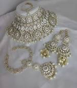 Luxurious white kundan bridal set - complete semi wedding jewelry collection with pearl embellishments