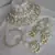 Luxurious white kundan bridal set - complete semi wedding jewelry collection with pearl embellishments