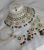 Luxurious maroon kundan bridal set - complete semi wedding jewelry collection with pearl embellishments