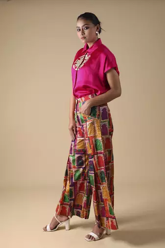 Pink hand embroidered shirt with pleated pants
