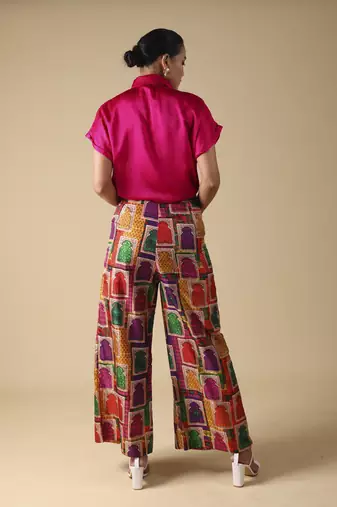 Pink hand embroidered shirt with pleated pants