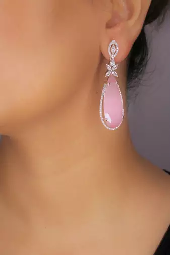Pink rhodium plated zircon pink synthetic stone dangler earrings