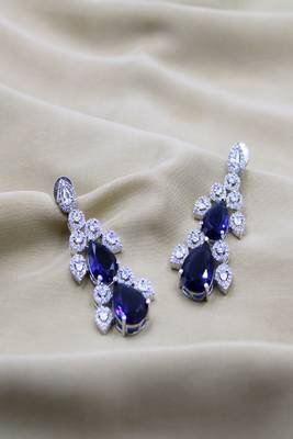 Blue rhodium plated blue synthetic stone zircon studded drop earrings 1