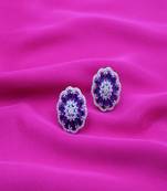 Blue rhodium plated purple synthetic stone zircon flower stud earrings