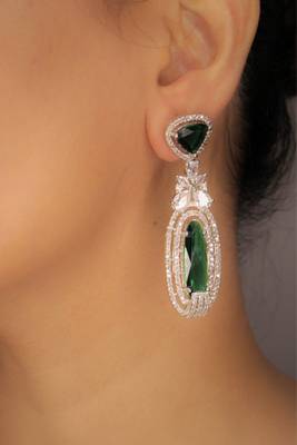 Green rhodium plated green stone zircon studded dangler earrings 1