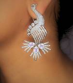 White rhodium-plated peacock design with zircon dangler earrings
