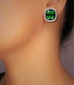 Green rhodium-plated ad studded green synthetic stone stud earrings