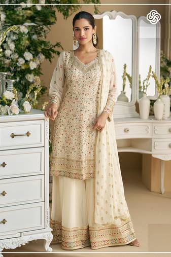 Cream embroidered faux georgette semi-palazzo style salwar suit