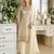 Cream embroidered faux georgette palazzo style salwar suit