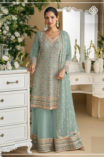 Sky embroidered faux georgette semi-palazzo style salwar suit
