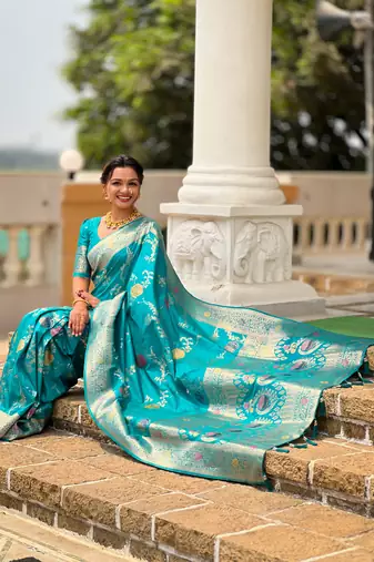 Sea green soft Silk Blend saree with zari weaving meenakari design