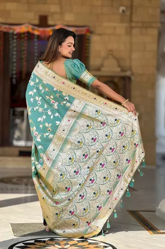 Pista soft banarasi silk blend meenakari weaving saree with unstitched blouse