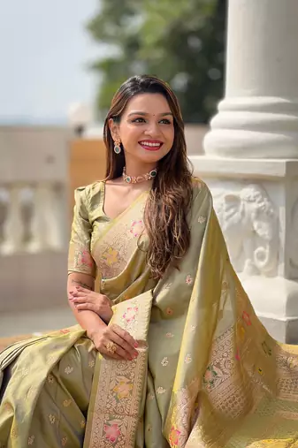 Pista soft banarasi silk blend meenakari weaving saree with unstitched blouse